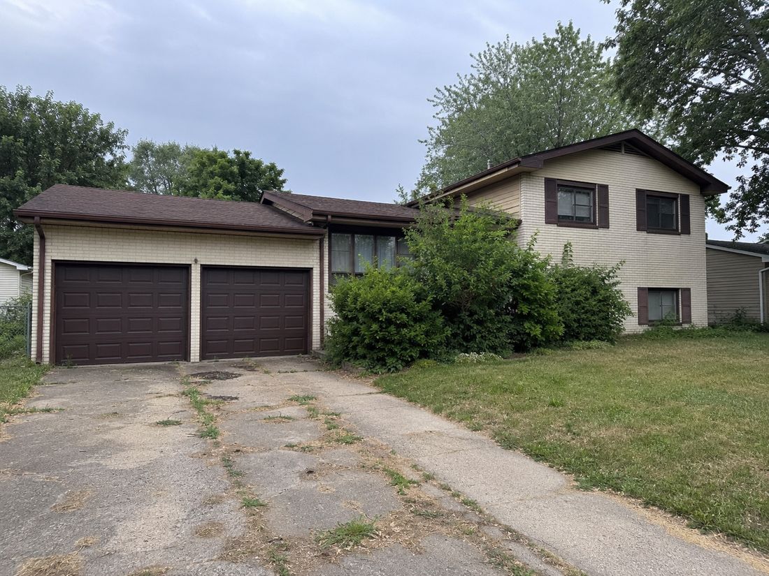 A two-story rental home with a double garage